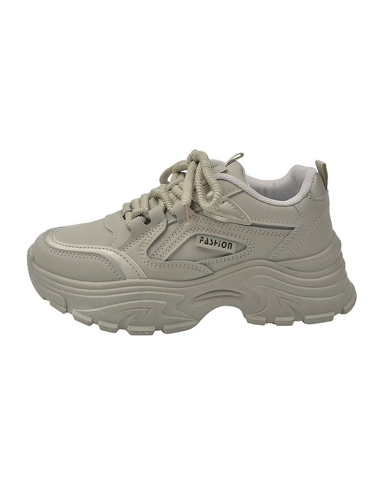 It's a small, thick old man's shoe, and she's in the middle of the day