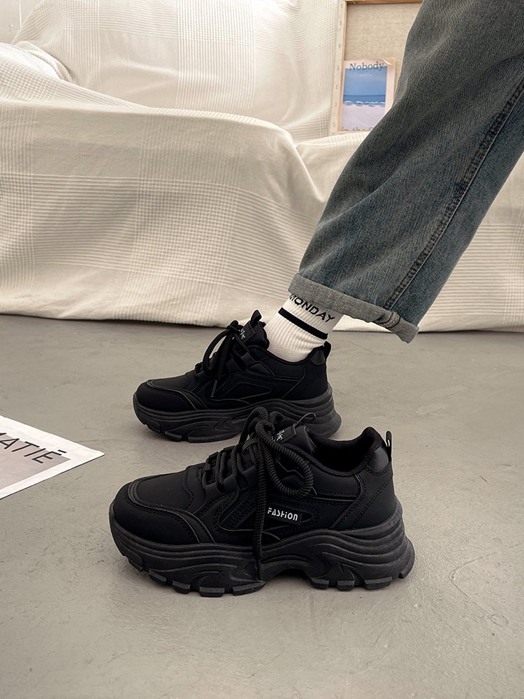 It's a small, thick old man's shoe, and she's in the middle of the day
