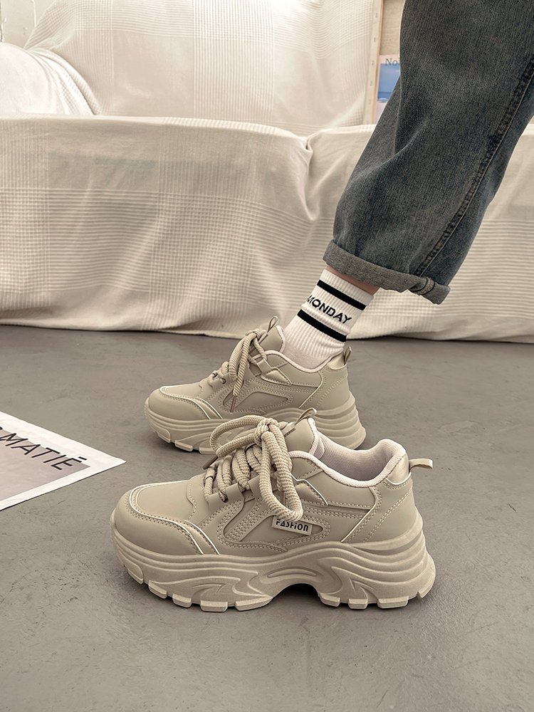 It's a small, thick old man's shoe, and she's in the middle of the day