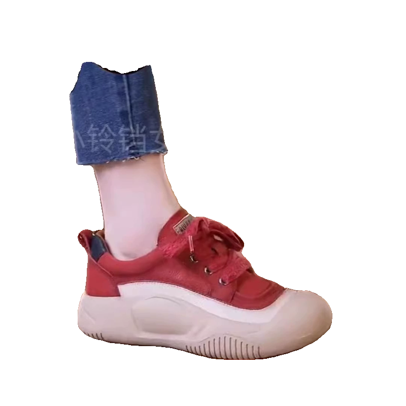 Scratch-coated, red-skinned old man's shoes