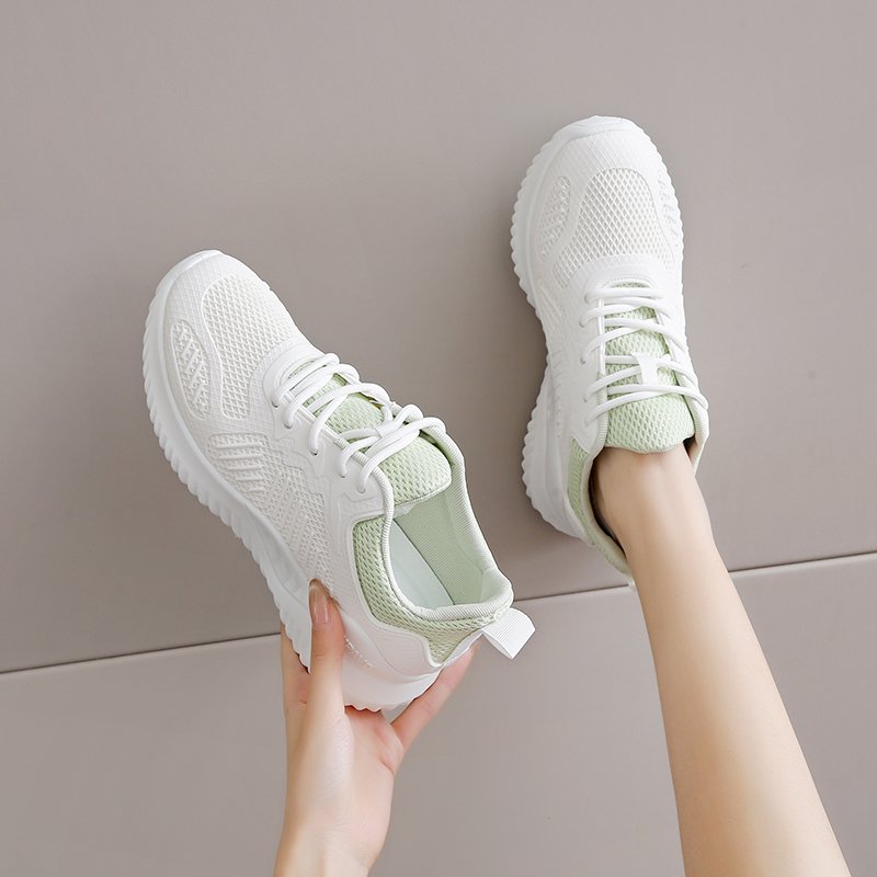 A girl with a middle-shoe sports exam and a girl with a little white-shoe in her Autumn air