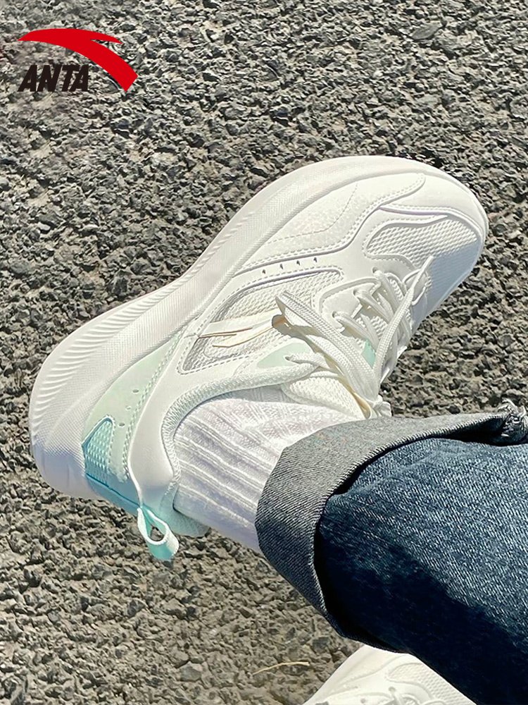 A girl with a girl's shoes is flying in the fall