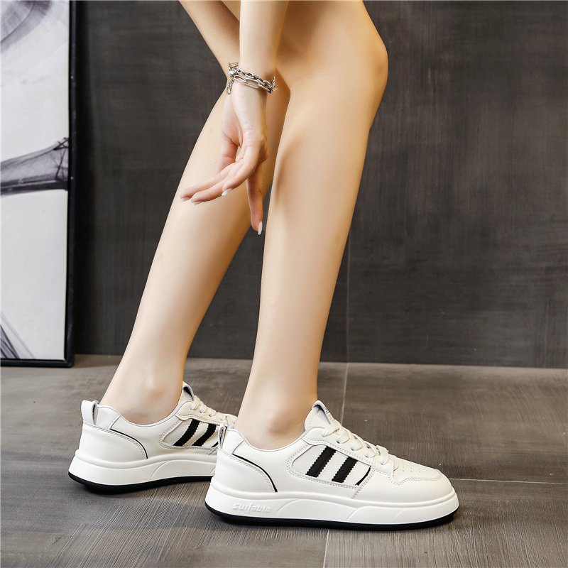 The girls with the white shoes are on the bottom of 2024
