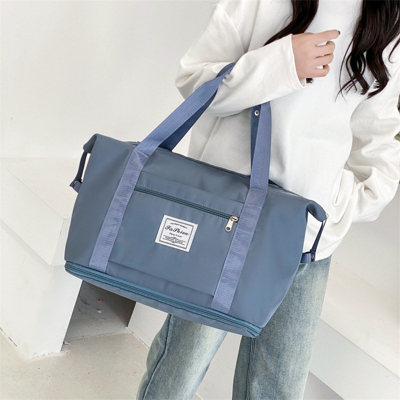 A hand-held travel bag for a doll to travel on one shoulder to collect a black yoga kit on short notice