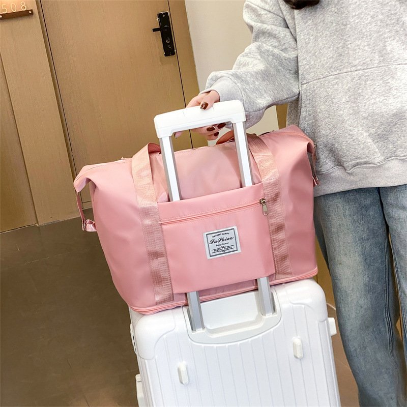 A hand-held travel bag for a doll to travel on one shoulder to collect a black yoga kit on short notice