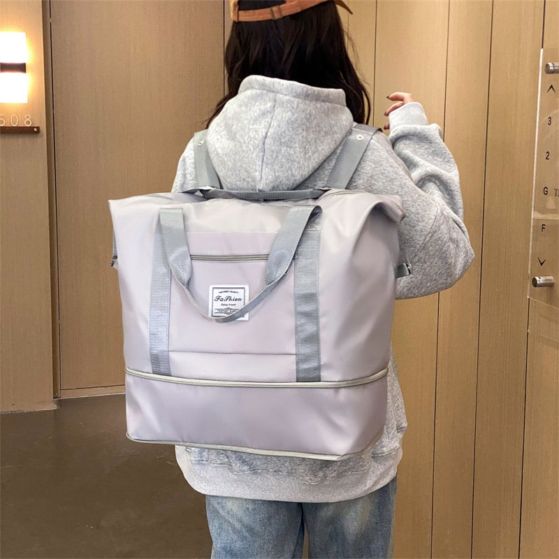 A hand-held travel bag for a doll to travel on one shoulder to collect a black yoga kit on short notice