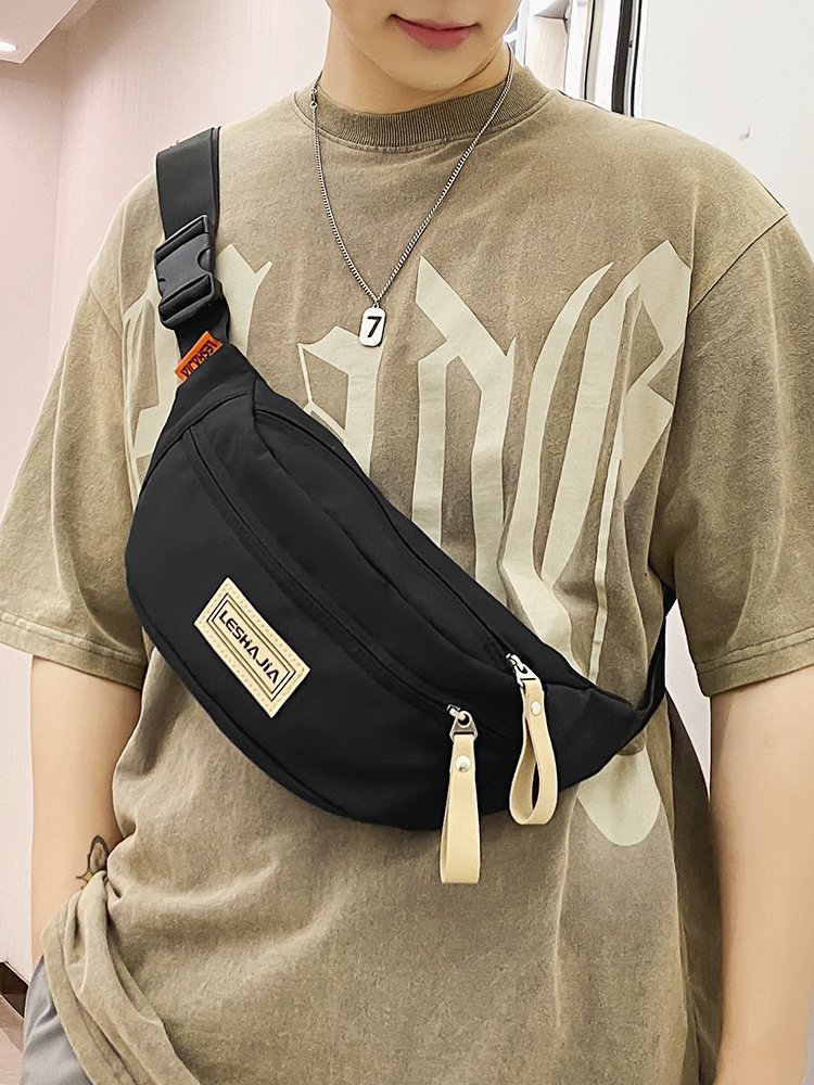A slashy-packed man with a one-shoulder chest bag and a rest-and-go-back bag