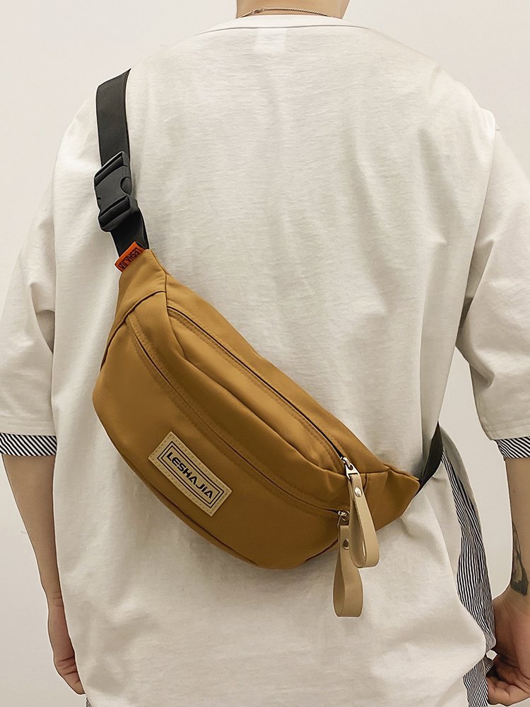 A slashy-packed man with a one-shoulder chest bag and a rest-and-go-back bag
