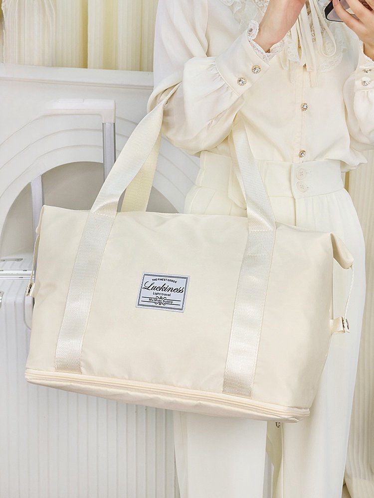 Travel bag, large-capacity female traveler's handbag, gymnasium and light students' bag waiting to be delivered