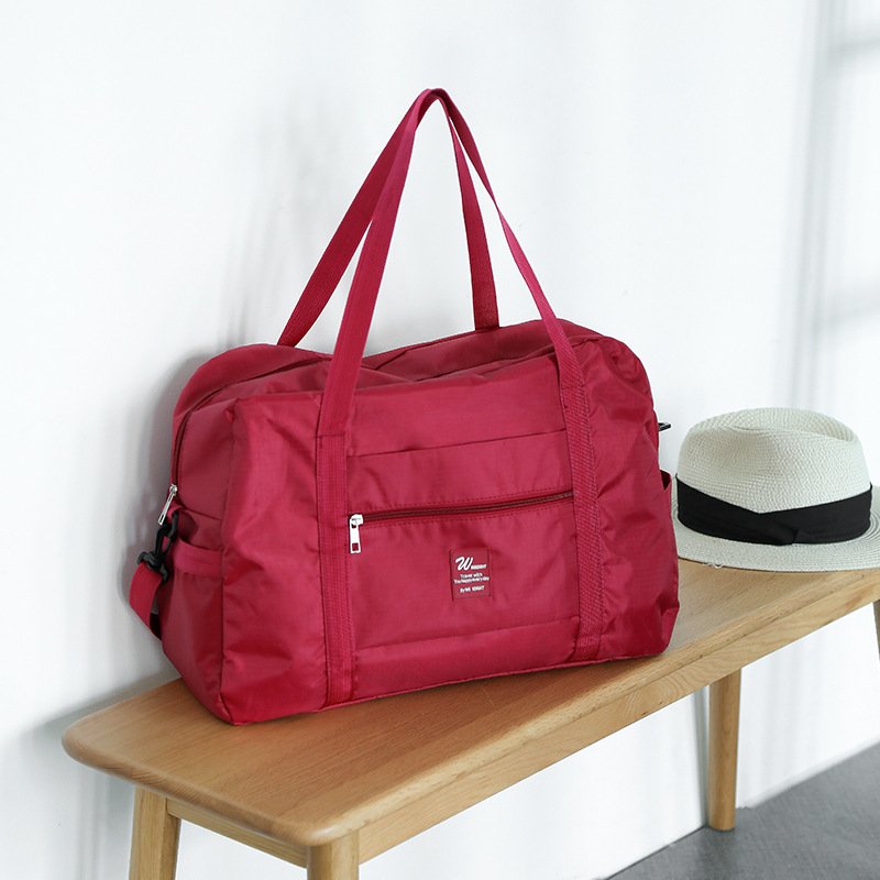 I'll take a bag to travel with a large volume of waterproof folding bags
