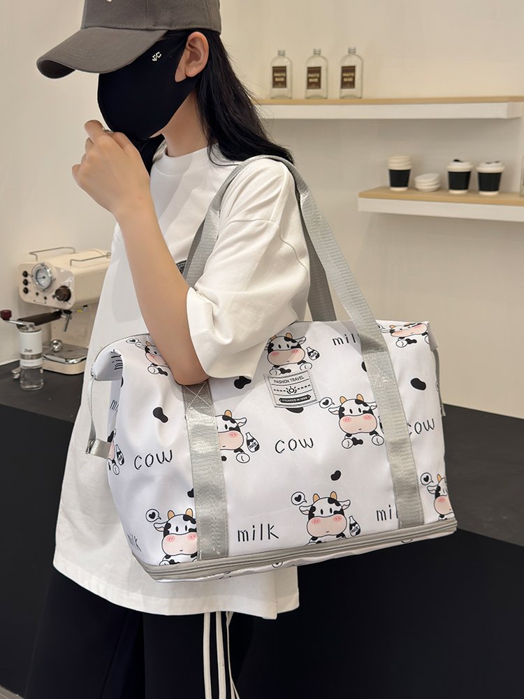 A large-capacity lady's hand-carrying bag for a short trip to travel with a stick for delivery