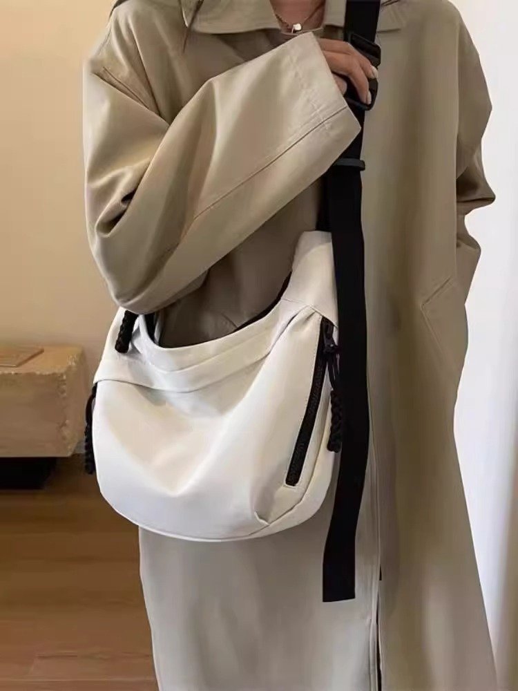 A new 2024 dumpling bag with a one-shoulder-to-man large-capacity dhow-bag phone