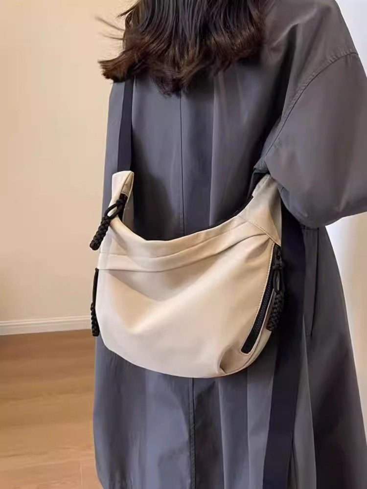 A new 2024 dumpling bag with a one-shoulder-to-man large-capacity dhow-bag phone