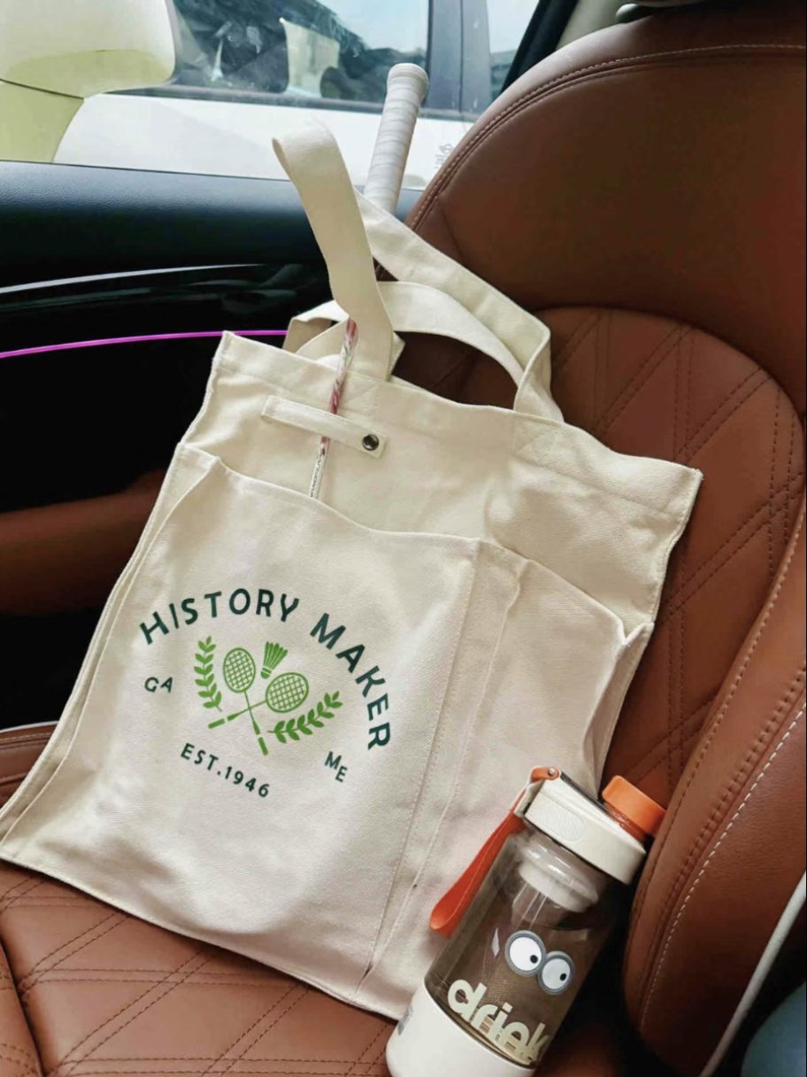 the badminton bag is full of tarp bags, a large one-capable one-capped sports bag, and a toy bag