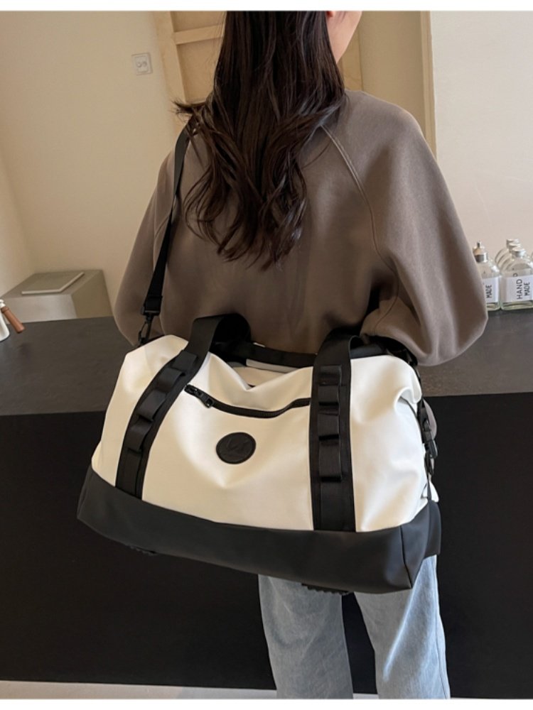 Travel bag handbags with a large capacity of luggage can be fitted with a sticker box to be flown on a one-shoulder kit for water-resistant fitness training
