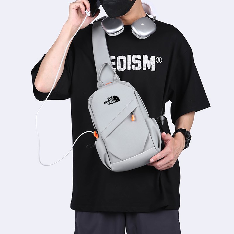 THENORTHFACE NORTH SIDE SLASHY-PACKED MALE SPORTSMEN'S TROUPE PACKS AND TWIT PACKS ON ONE SHOULDER