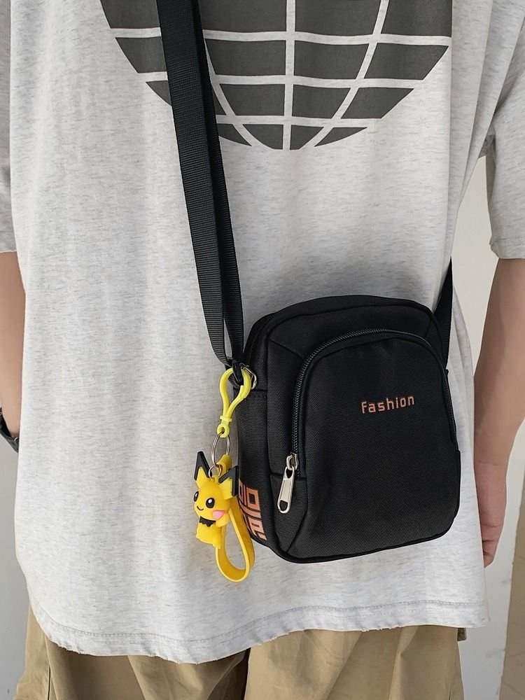 A guy with a one-shoulder bag, a guy with a guy with a bag, a sports bag, a cell phone