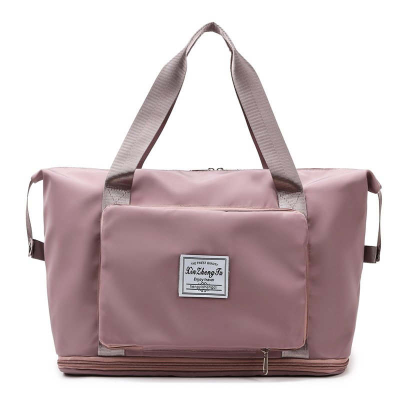 She's got a big bag, she's got a big stick, she's on a trip, and she's got a sports bag