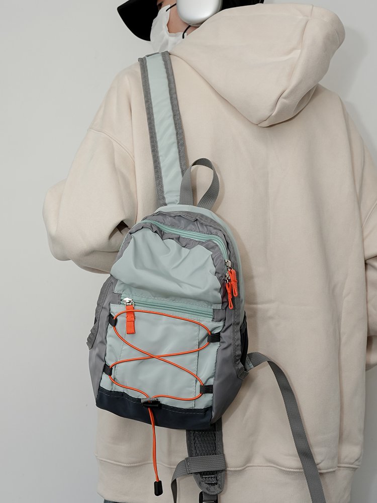 Traveling outdoors with a light shoulder bag for a climber, a backpack for a ride