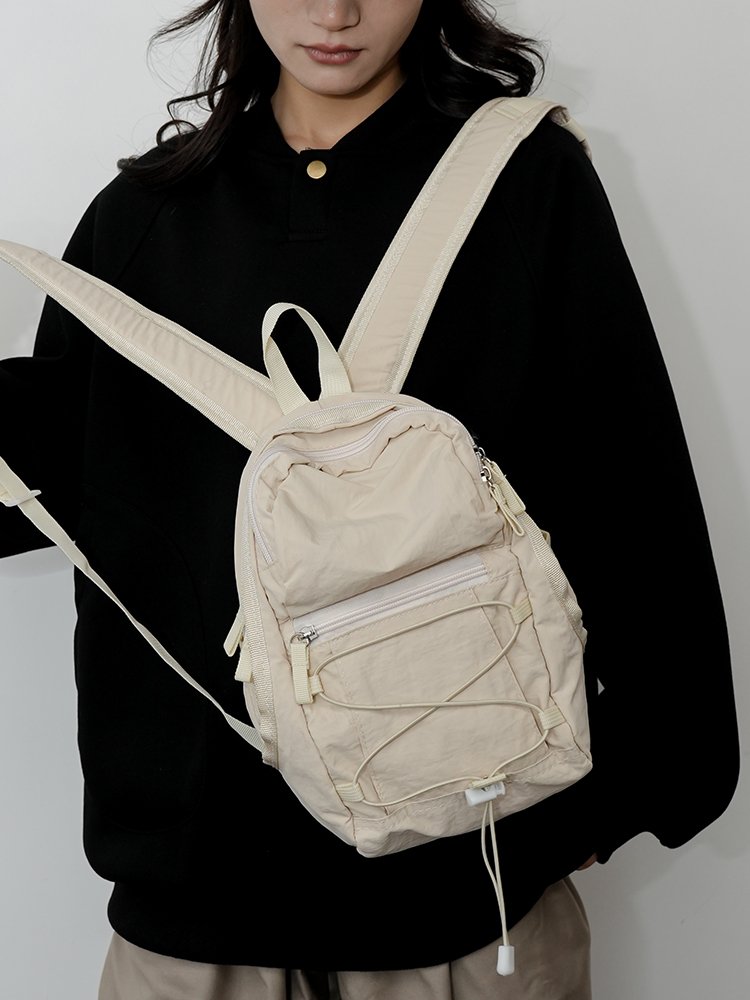Traveling outdoors with a light shoulder bag for a climber, a backpack for a ride