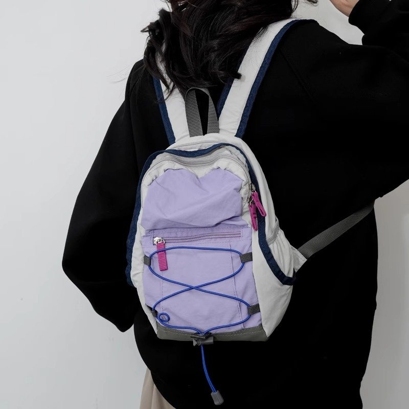Traveling outdoors with a light shoulder bag for a climber's backpacker nylon bag