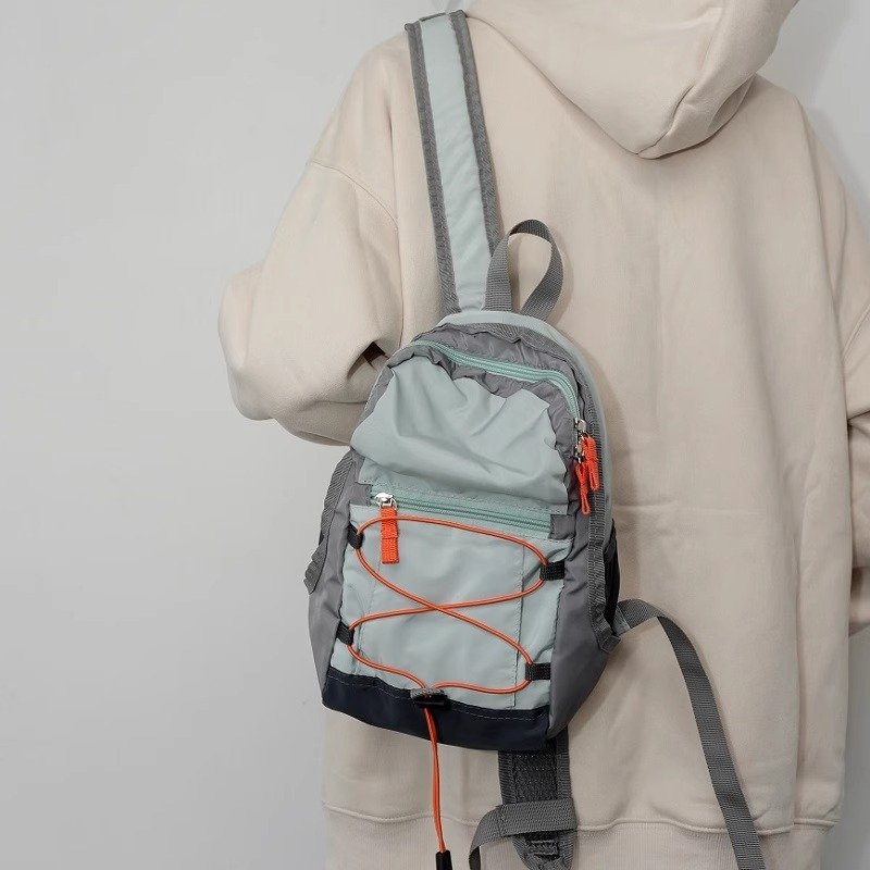 Traveling outdoors with a light shoulder bag for a climber's backpacker nylon bag