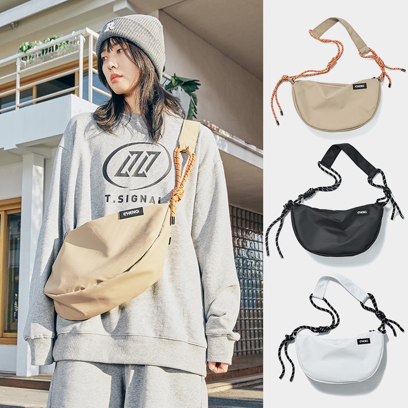 A 2024 new large-capacity commuting pack for a man in a slop bag and a man in a one-shoulder bag
