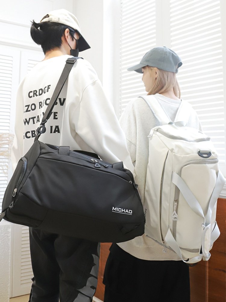 Travel packs for women with a large capacity of two-shouldered, dry-wet-separated sports and fitness packs with a puller case baggage attachment