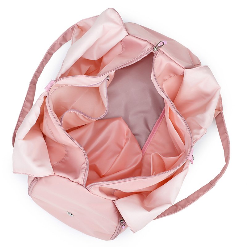 A sports bag with a swim and a yoga bag with a light shoulder and a short trip