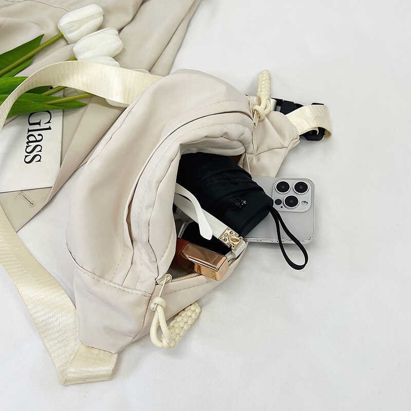 A new 2024 slashy bag for a girl with canvass and a sports phone for the summer
