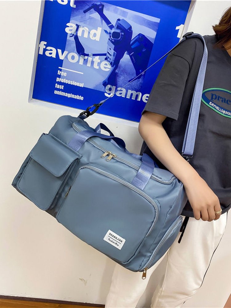 A travel bag for a woman with an extra capacity to carry a long-distance swim and gym bag for a male student