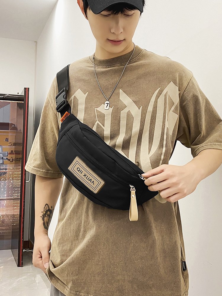 A slashy-packed man with a one-shoulder chest bag and a sashy-tip-sleeve