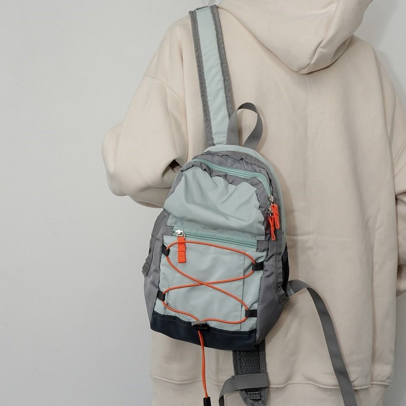 Traveling outdoors with a light shoulder bag for a climber, a backpacker, and a scrambler