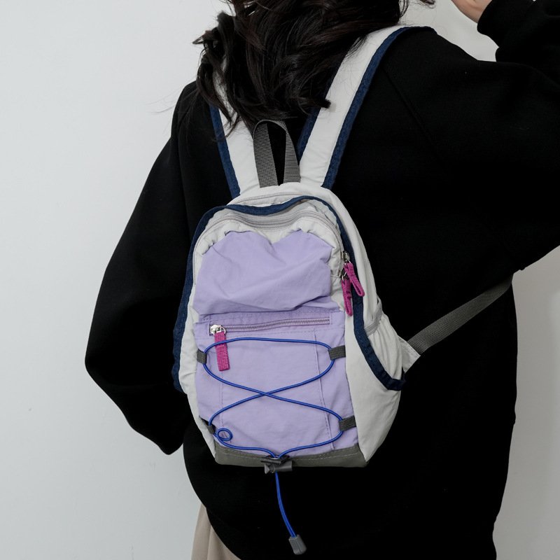 Traveling outdoors with a light shoulder bag for a climber, a backpacker, and a scrambler
