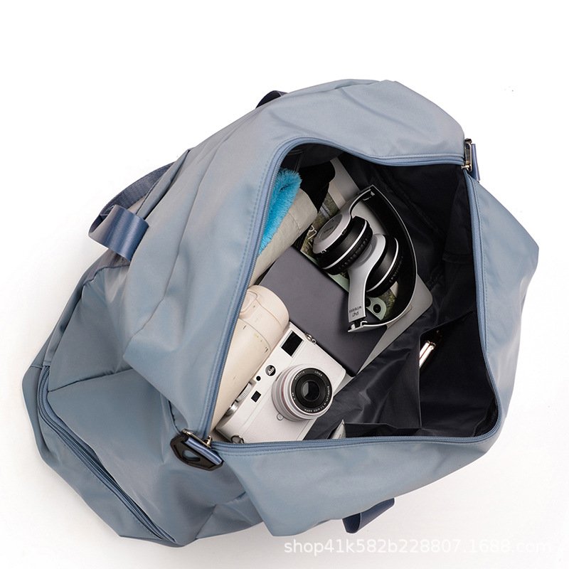 A girl with a big, wet, dry-segregated travel kit brings a man's sports bag of pure color