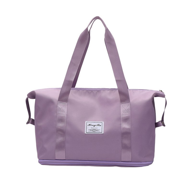 She's got a big bag, she's got a big stick, she's on a trip, and she's got a sports bag