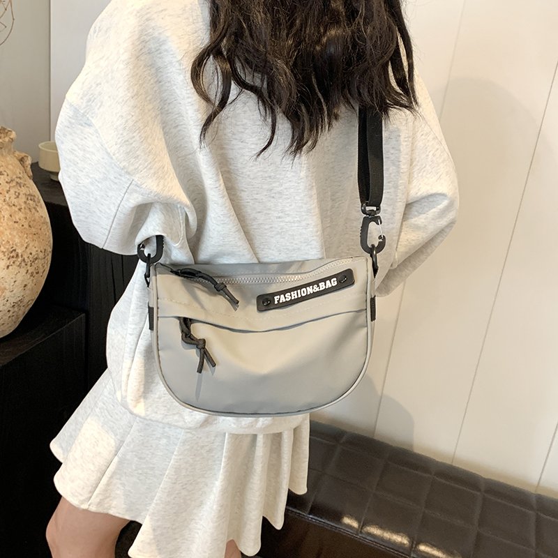 2024 new slashy bag, new black simplistic sports bag, light-seated one-shoulder, leisure-trip backpack
