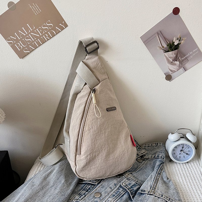 A new 2024 traveler for a girl with a slashy backpack, and a light trip bag for her
