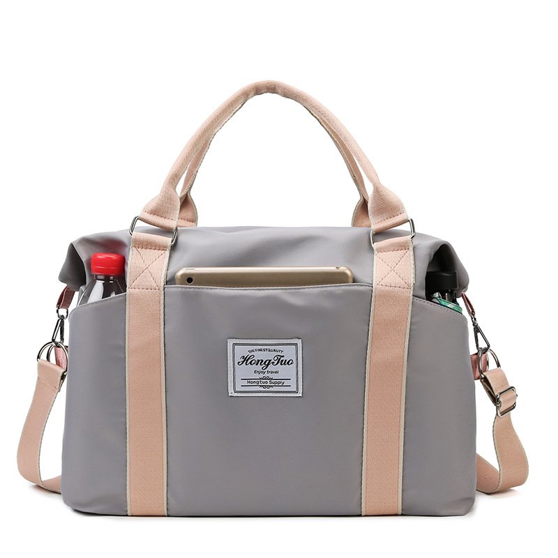 A travel bag for a woman with a new handbag, a Korean one-shoulder-slashed sports bag