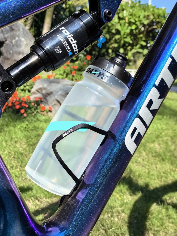 Aluminium alloy canteens mounted on a mountain road vehicle with a wheeled superlight cycling cycling bicycle