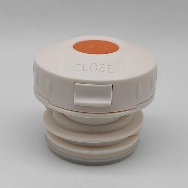 A general lid-covered stainless steel canteen switch on the inside of the cup