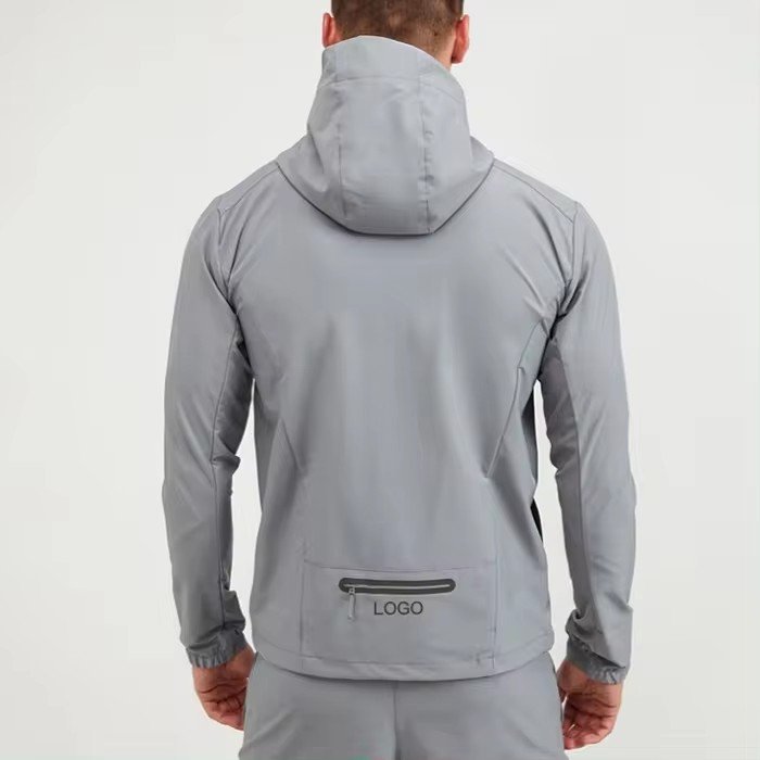 Outdoor trekking jacket with windproof waterproof technology suitable for all-weather hiking and mountaineering adventures.