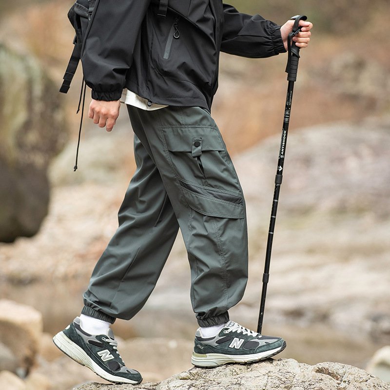 LAYENNE High Quality Custom Logo outdoor pants wholesale multi-pockets camouflage soft shell windbreaker Sweatpants Men