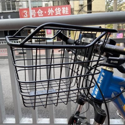 A high-quality front-bed train basket with a lid on a mountain sports vehicle