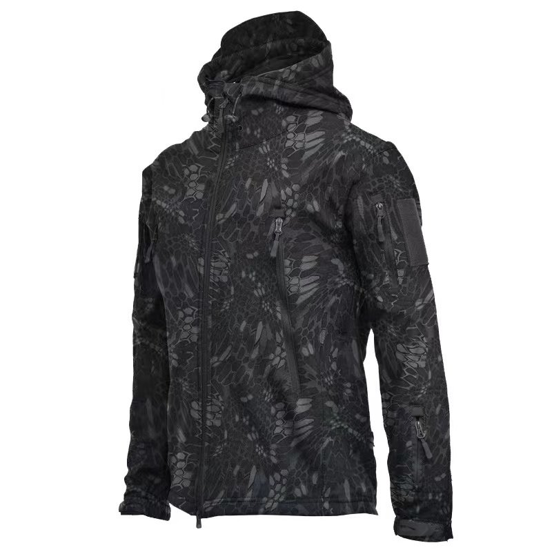 Three-in-one outdoor jacket for hiking camping and trekking designed to provide warmth and comfort in challenging environments