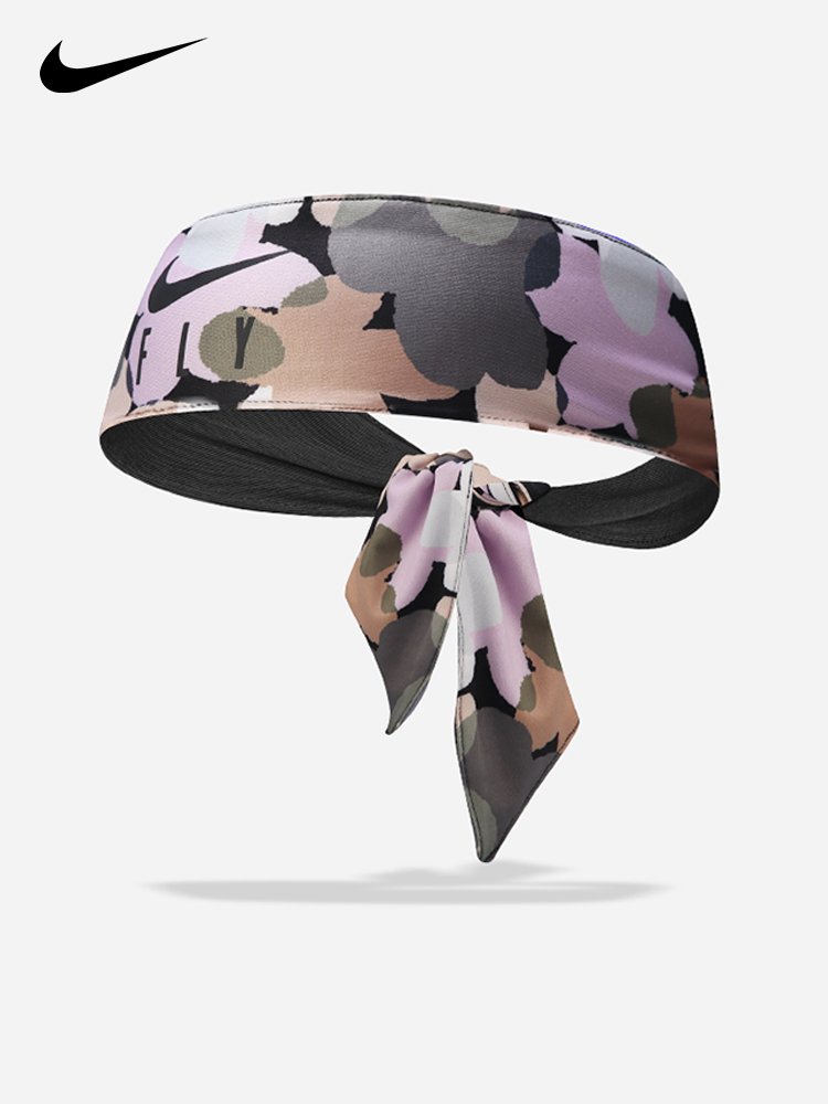 NIKE'S HEAD WITH A NIKE TURBAN TENNIS BALL