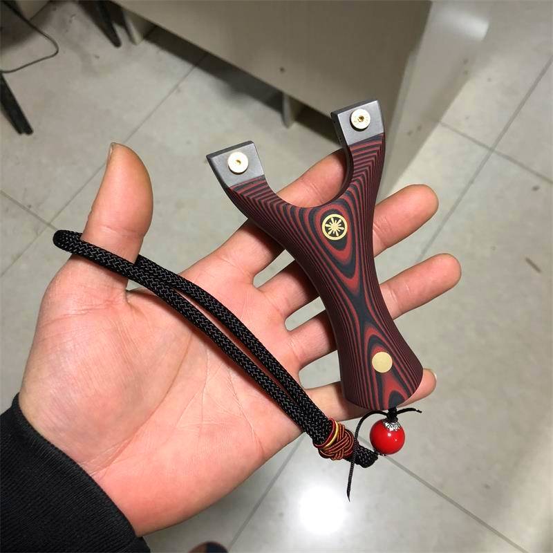the titanium titanium titanium steel g10 light tg tg 10 sticker, squeezing the pelvis, and slinging the slingshot