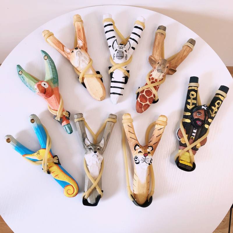 Solid wood carving slingshot toy cartoon animal children's wood shooting with old sponge soft bombs creative gift