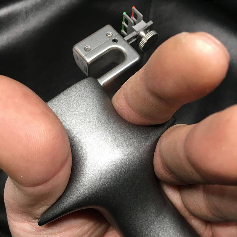 Iron Man slingshots and bows together to catch a flat-skined titanium alloy