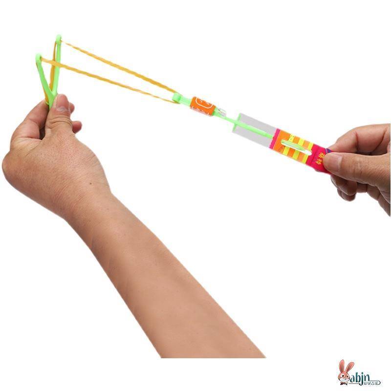 Small toy night thread flash ejection male light bamboo dragonfly hand rubbing the sky fairy hand to push the children's glowing slingshot flying arrow